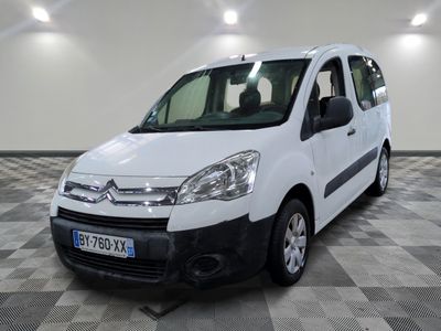 the white van is parked on a checkered floor in a room