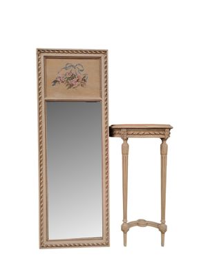 an image of a mirror and a table with a mirror on top of it