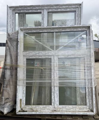 a large window that is sitting on the back of a truck