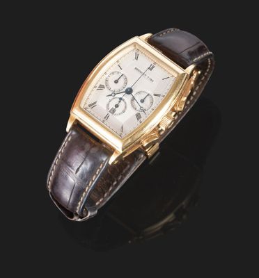 une montre-bracelet en or 18 carats avec un bracelet en cuir marron