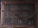 a picture of an old wooden box with a rope