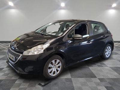 a picture of a black car parked in a garage