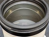 a close up of a camera lens on a stand
