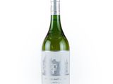 a bottle of wine that is sitting on a table