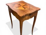 an image of a wooden table with a geometric design on it