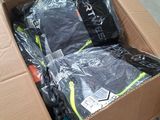 a cardboard box that has some clothes in it