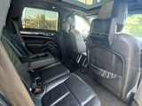 the back seats of a car are empty in the back of the car