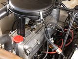 a close up of a car ' s engine in a vehicle