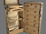 an open suitcase with a drawer inside of it