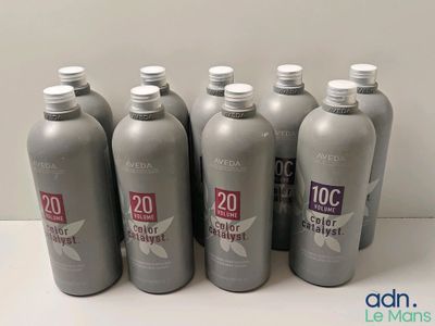 six flacons de lotion L'Oréal posés sur une table
