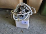 an image of a machine with a hose attached to it