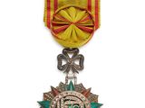 une image représentant une médaille ornée d'un ruban et d'une étoile