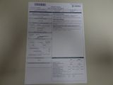 une photo d'une photo d'un ticket de caisse posé sur une table