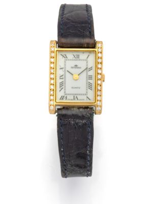 an image of a gold and diamond watch with a black leather strap