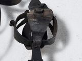 wrought iron wall sconce with a candle holder attached to it
