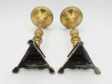 pair of brass and black marble candlesticks