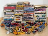 a lot of toy trains that are on the floor