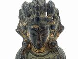an image of a statue of a woman with a bird on her head