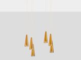 three gold colored lights hanging from the ceiling