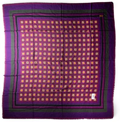 a close up of a purple and red square scarf on a white background