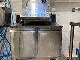 a machine that is sitting in the middle of a kitchen