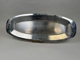 a silver tray that is sitting on a table
