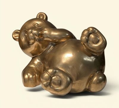 "Panda allongé" Sculpture en plâtre résiné or Hauteur : 30 c…