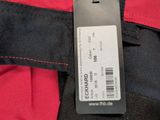 a label on the back of a red and black jacket