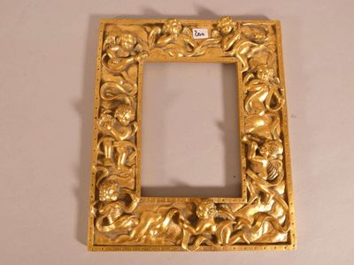 a picture of a gold picture frame on a table