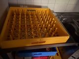 a large yellow basket that is sitting on top of a table