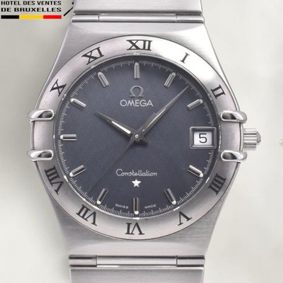 an image of a close up of a wrist watch with roman numerals