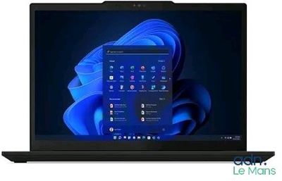 the laptop is open on a white surface with a blue background