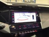 a picture of a car ' s dashboard with a camera mounted on it