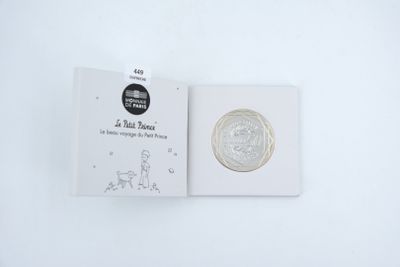 une image représentant un livre sur lequel figure l'illustration d'un homme et d'un chien