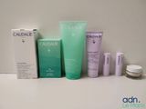 caudalie skin care products displayed on a white surface