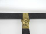 a black and gold cross with a gold cross on it