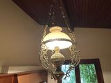 a light that is hanging from the ceiling in the kitchen