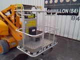 a picture of a small scissor parked in front of a building