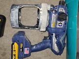 a cordless drill and a cordless hammer on the floor