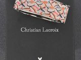 a picture of a hair clip on top of a book
