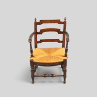 Fauteuil en bois naturel de style Provençal à assise paillée…