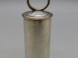 a silver metal container with a ring on top of it