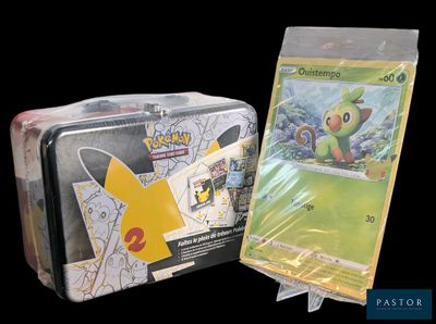 a box of pokemon cards sitting next to a box of pokemon cards