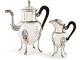 pair of antique silver plated teapots with black handles