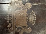 a wooden box that has a picture of a lion on it
