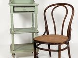 two chairs that are next to each other on a white background