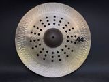 a close up of a white drum on a black background