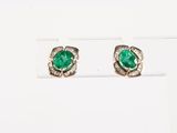 an image of a pair of emerald and diamond earrings
