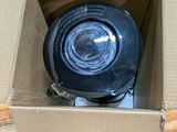 a box that has a black object inside of it