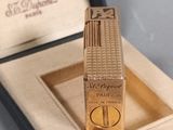 a lighter that is in a box on a table